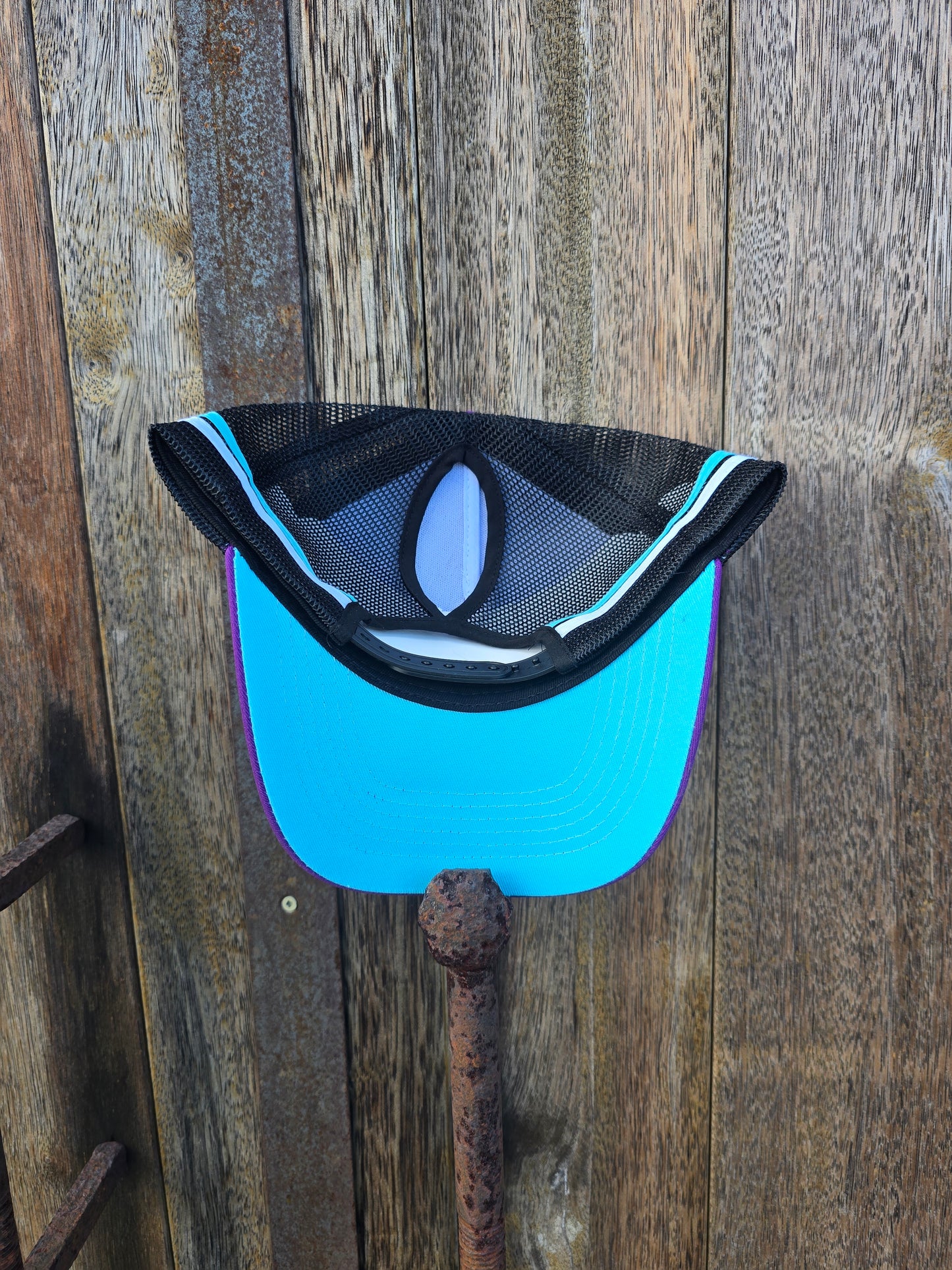 Purple on black blue underbrim ponytail