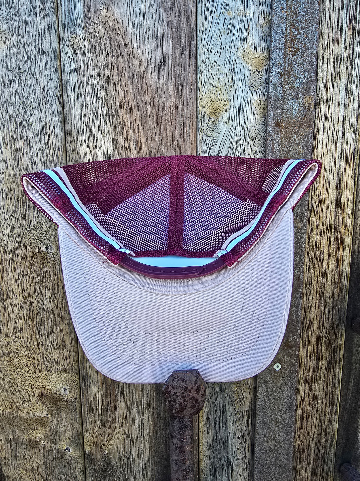 Dusty pink on maroon