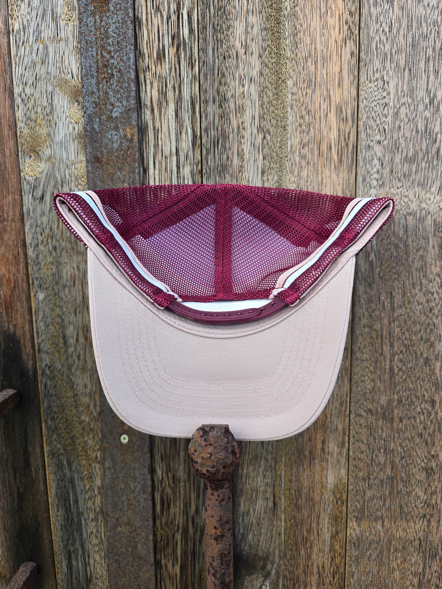 Dusty pink on maroon