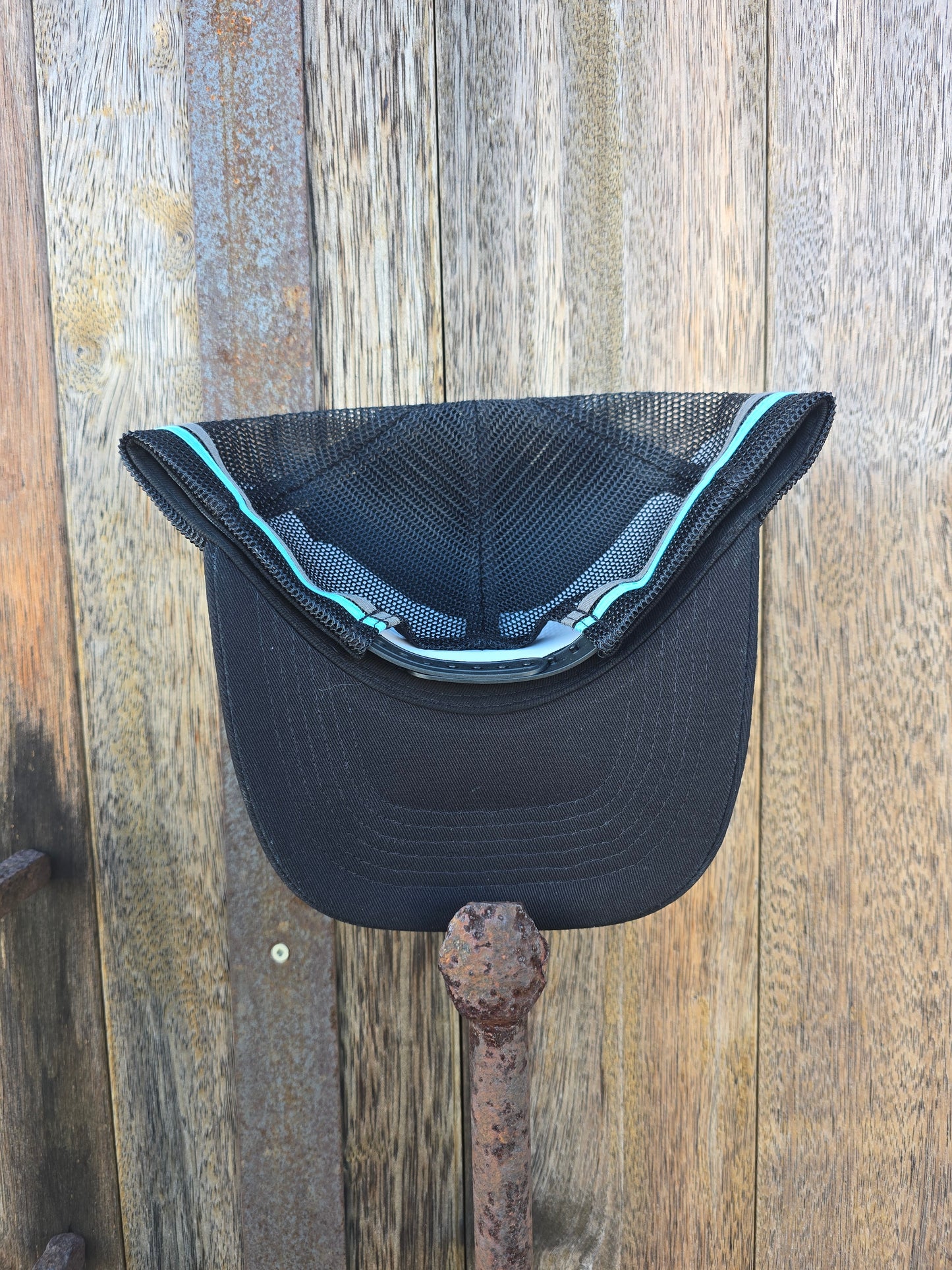 Teal on black