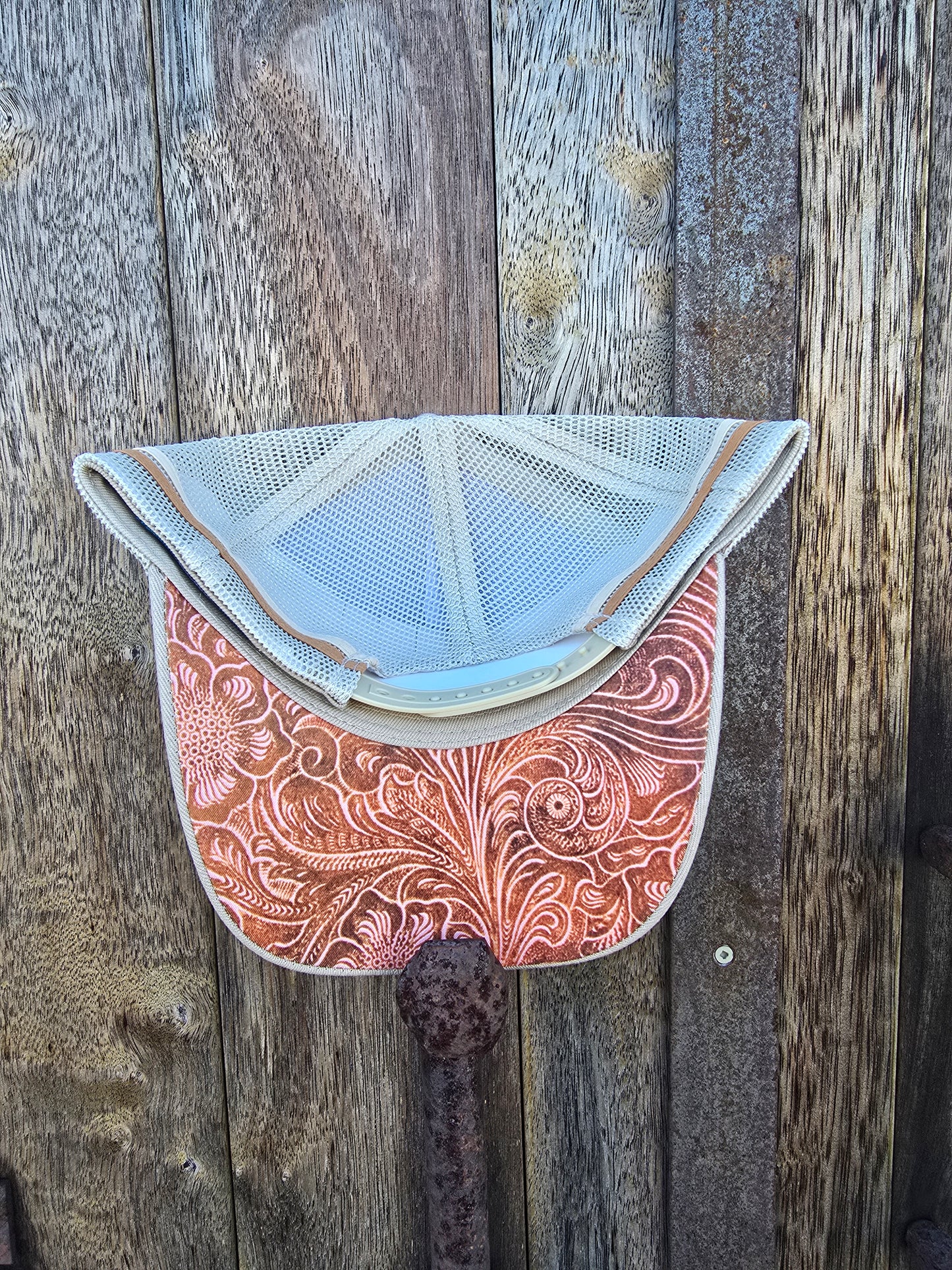 Tan with imitation embossed under brim