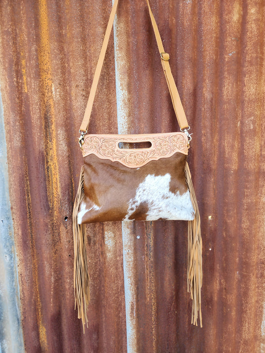 Large Tooled Tan and white tassled bag.