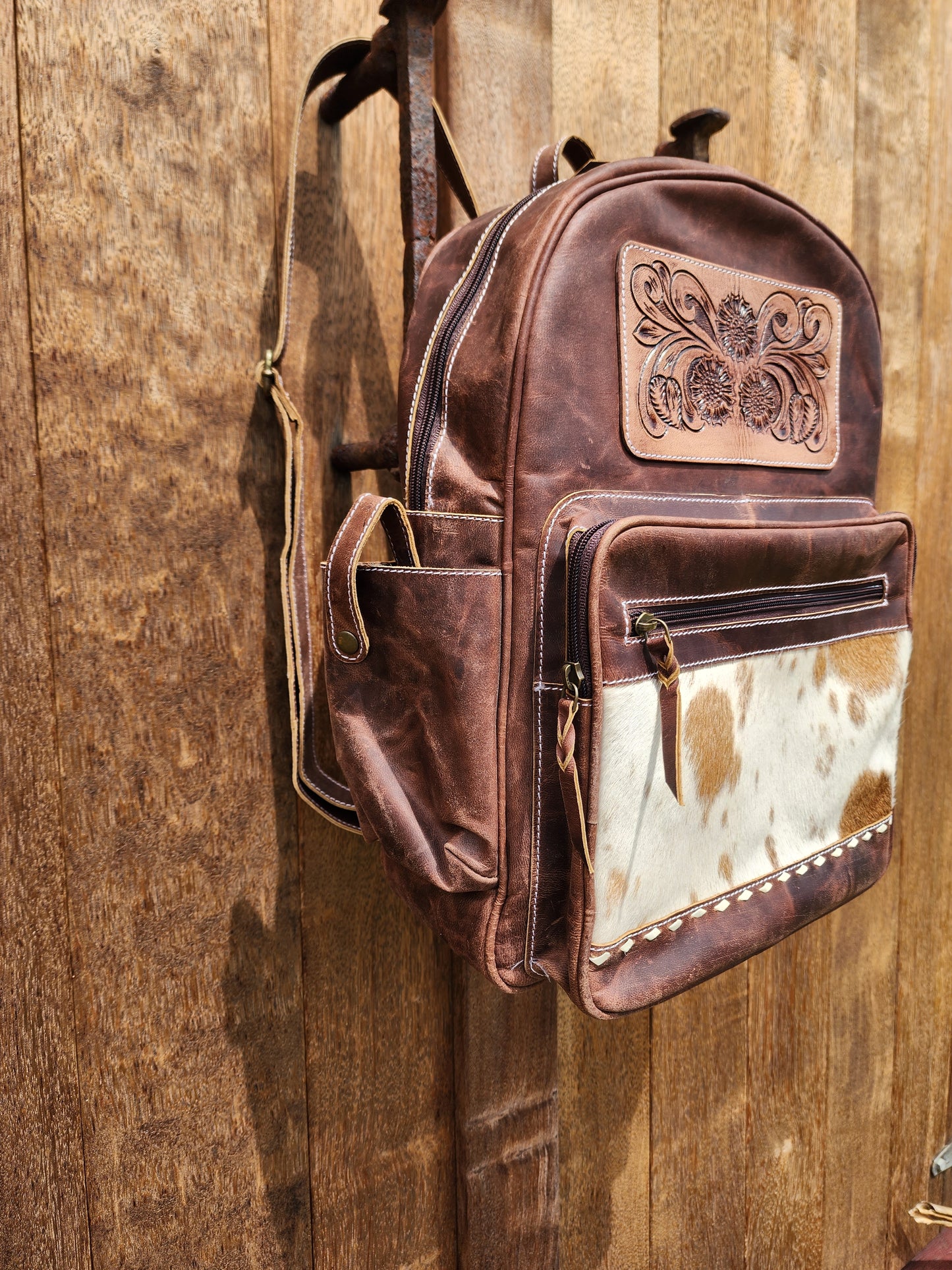 Antique Tan leather back pack with tooling details #01