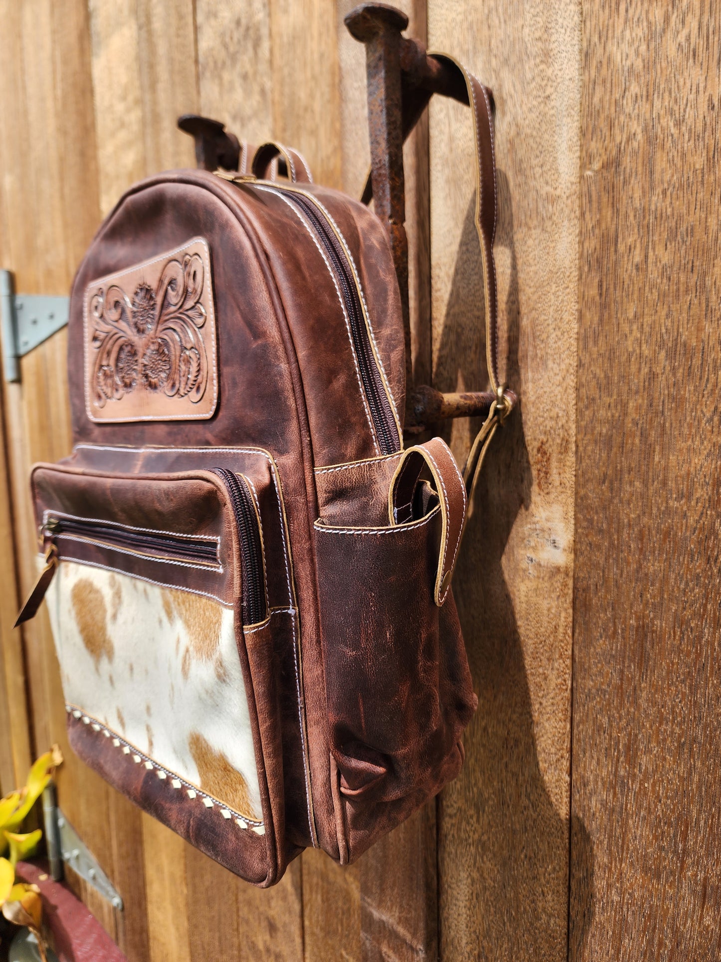 Antique Tan leather back pack with tooling details #01