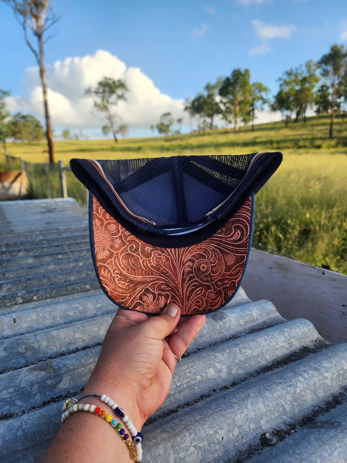 Denim with underbrim embossed patterning (embroiderd)