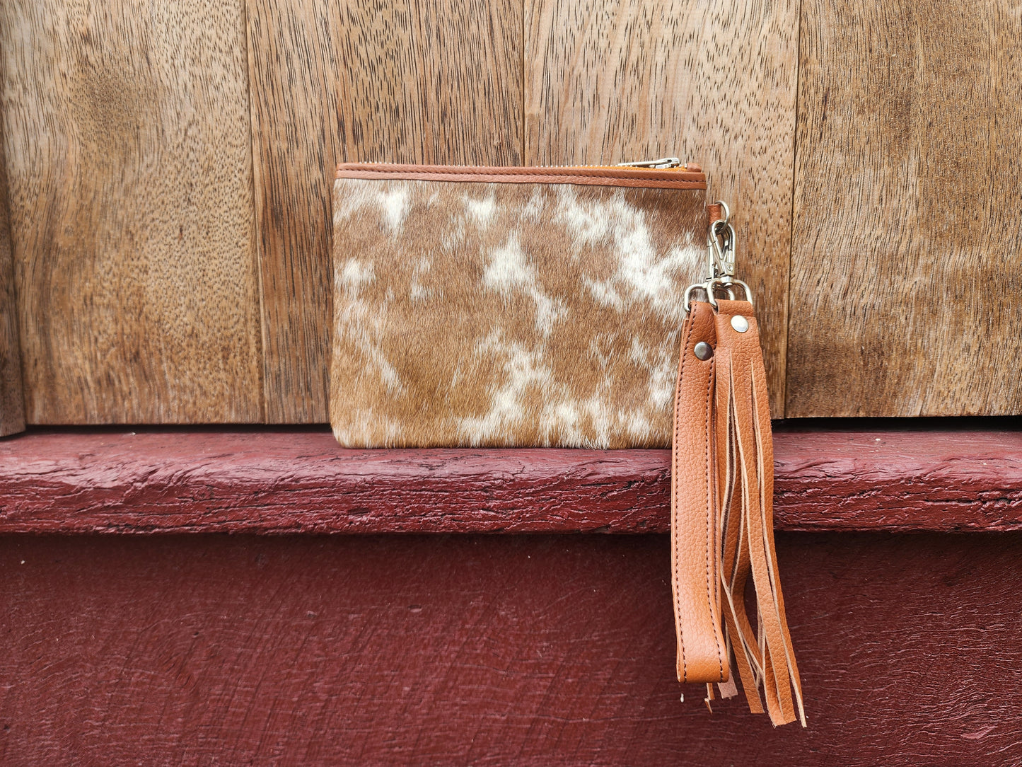 Hair on hide Detachable tassel clutch. #06