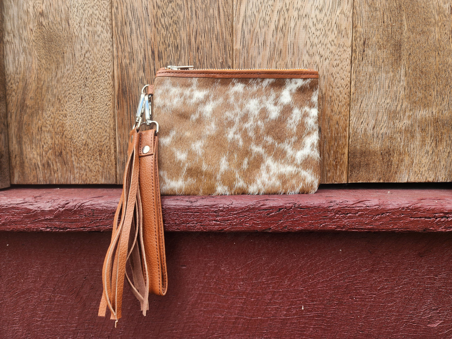 Hair on hide Detachable tassel clutch. #06