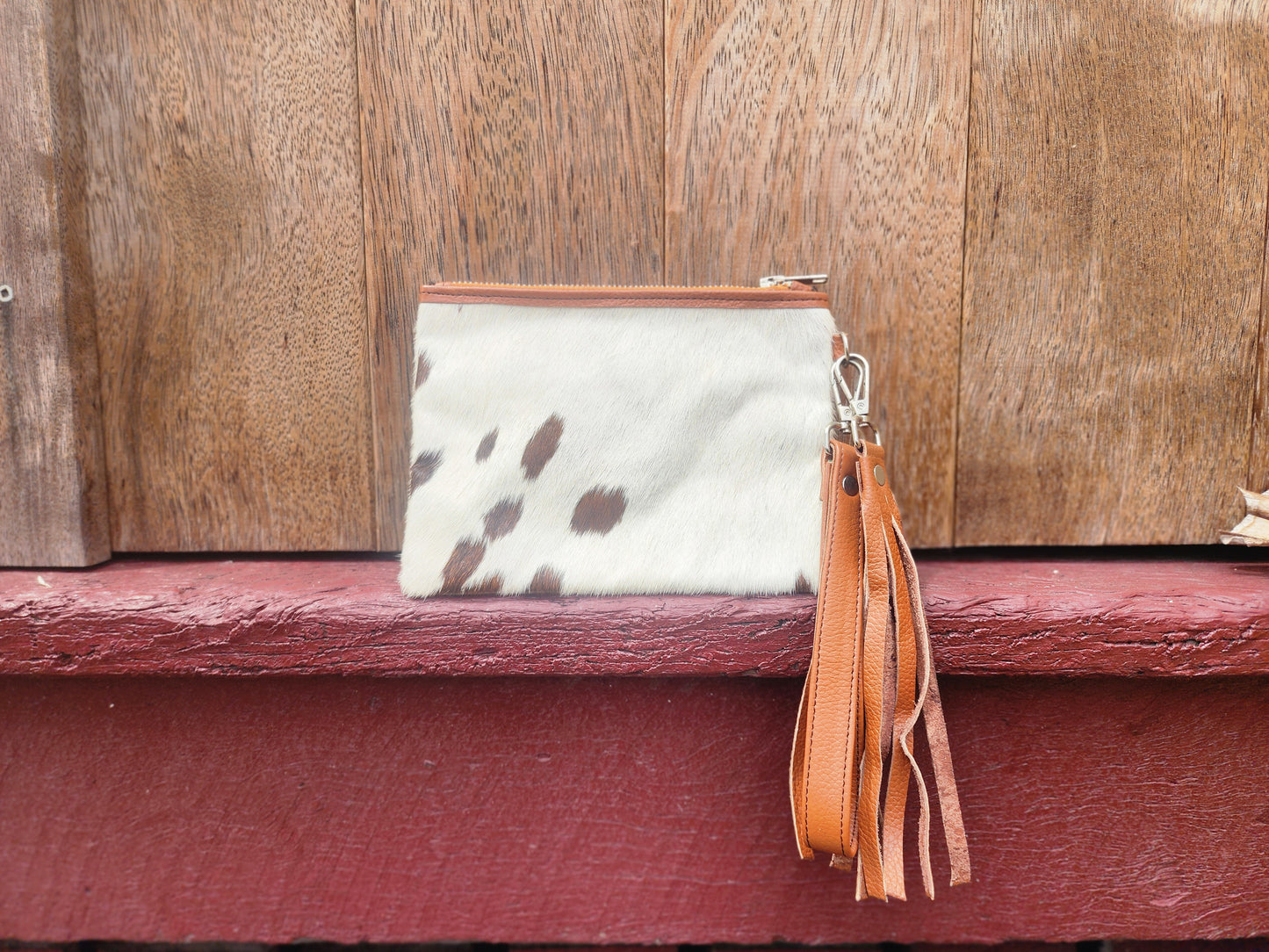 Hair on hide Detachable tassel clutch. #08