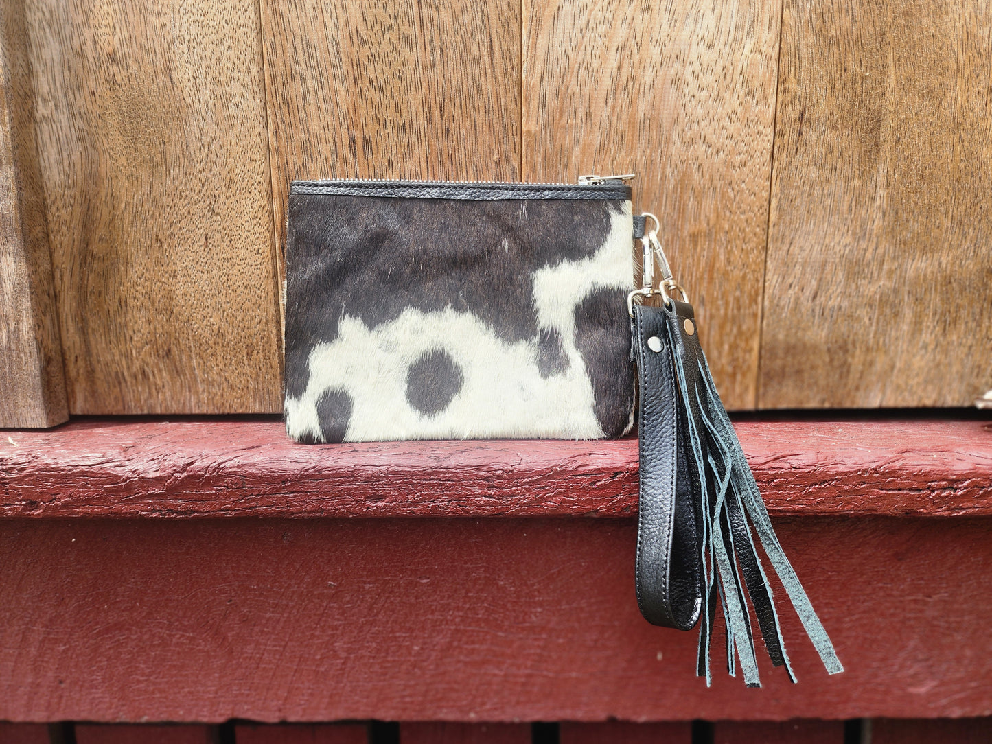 Hair on hide Detachable tassel clutch. #09