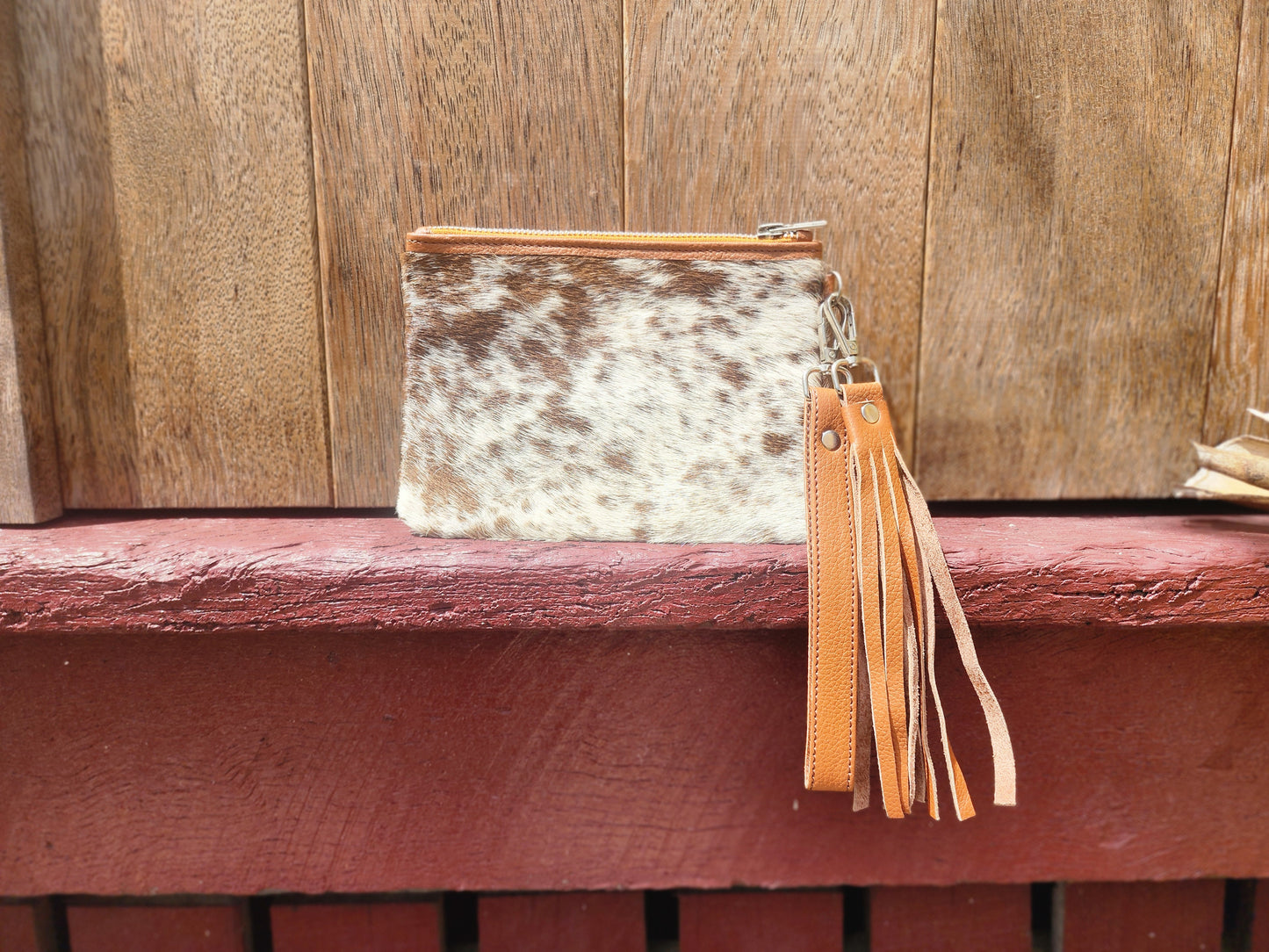 Hair on hide Detachable tassel clutch. #13