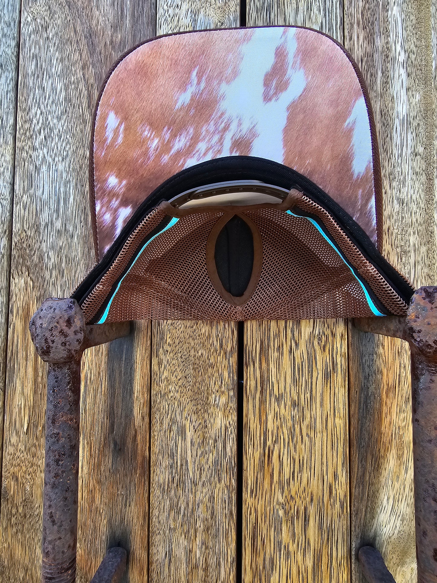 Brown with imitation cowhide print under brim pony cap (patch)