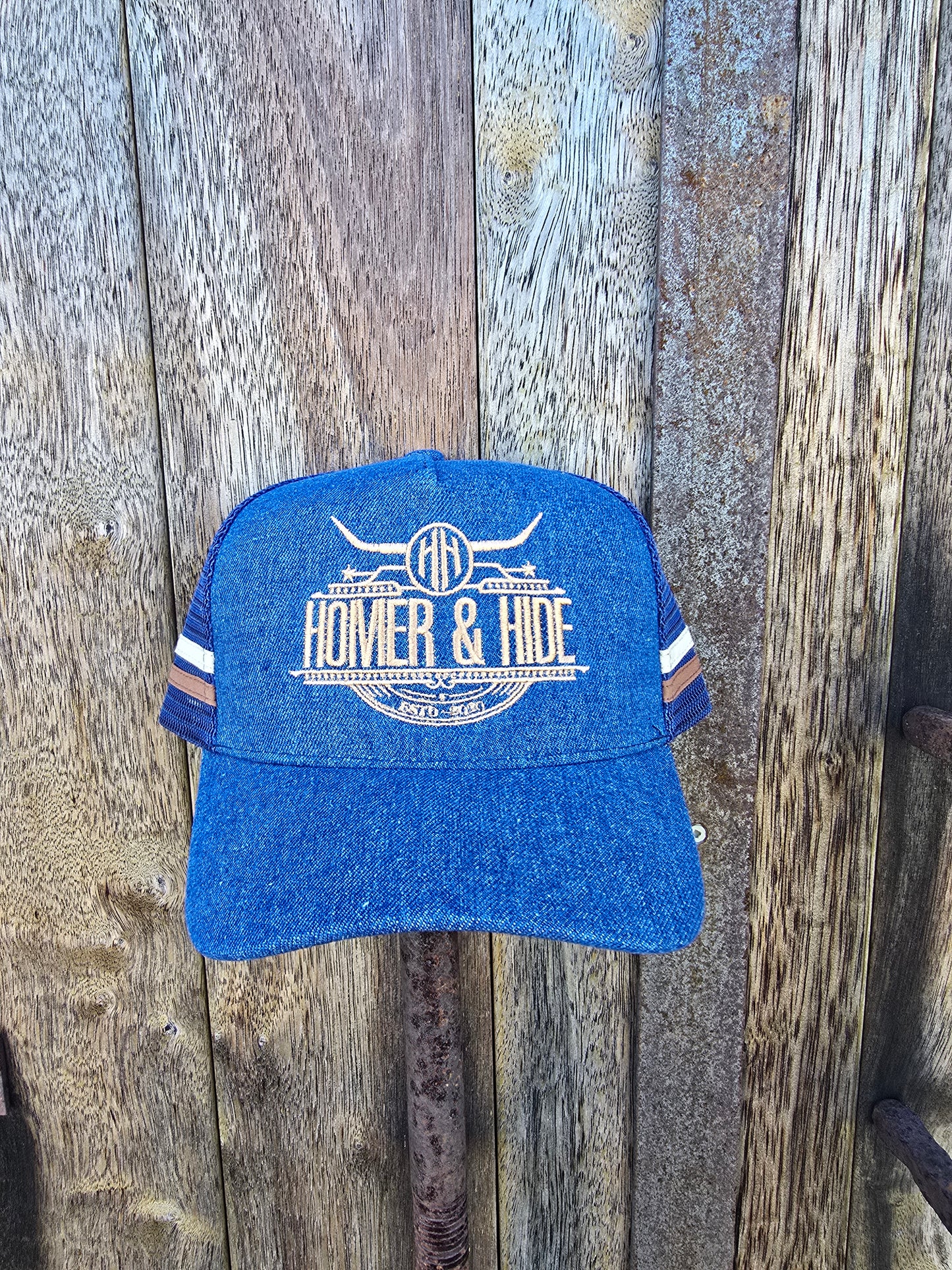 Denim with underbrim embossed patterning