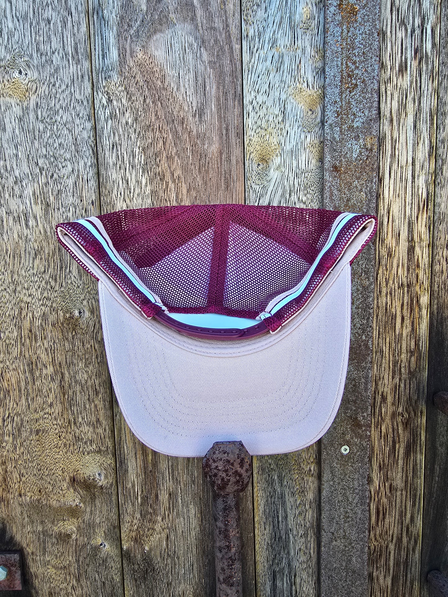 Dusty pink on maroon