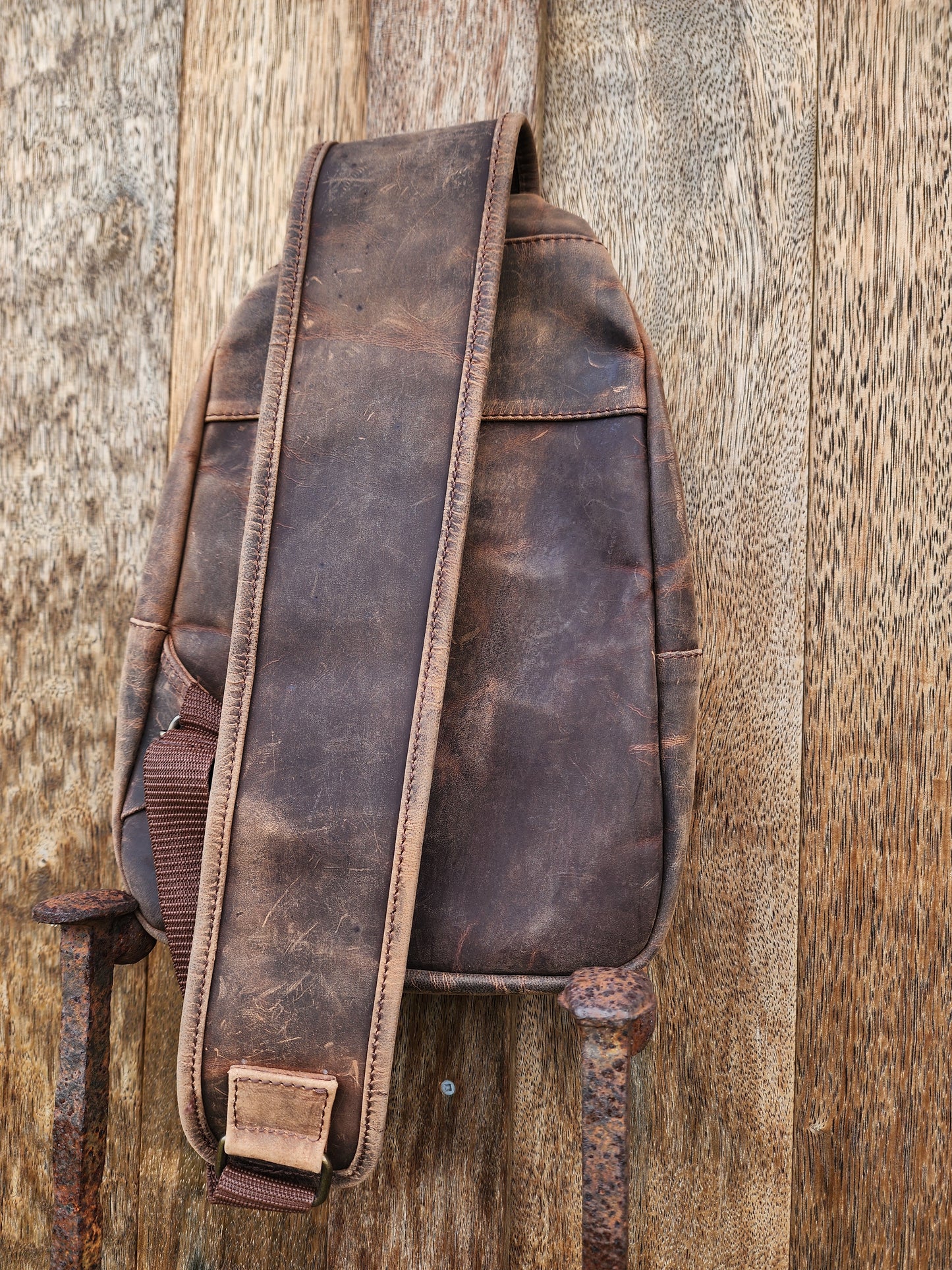 Antique leather Triangle chest sling bag