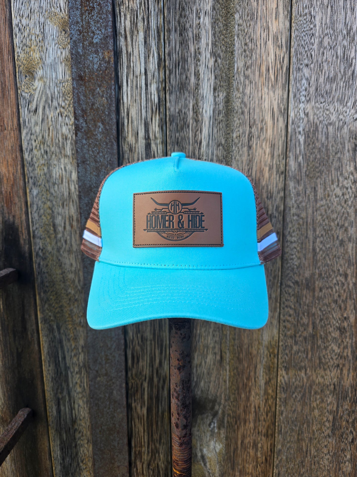 Light blue on brown ponytail cap