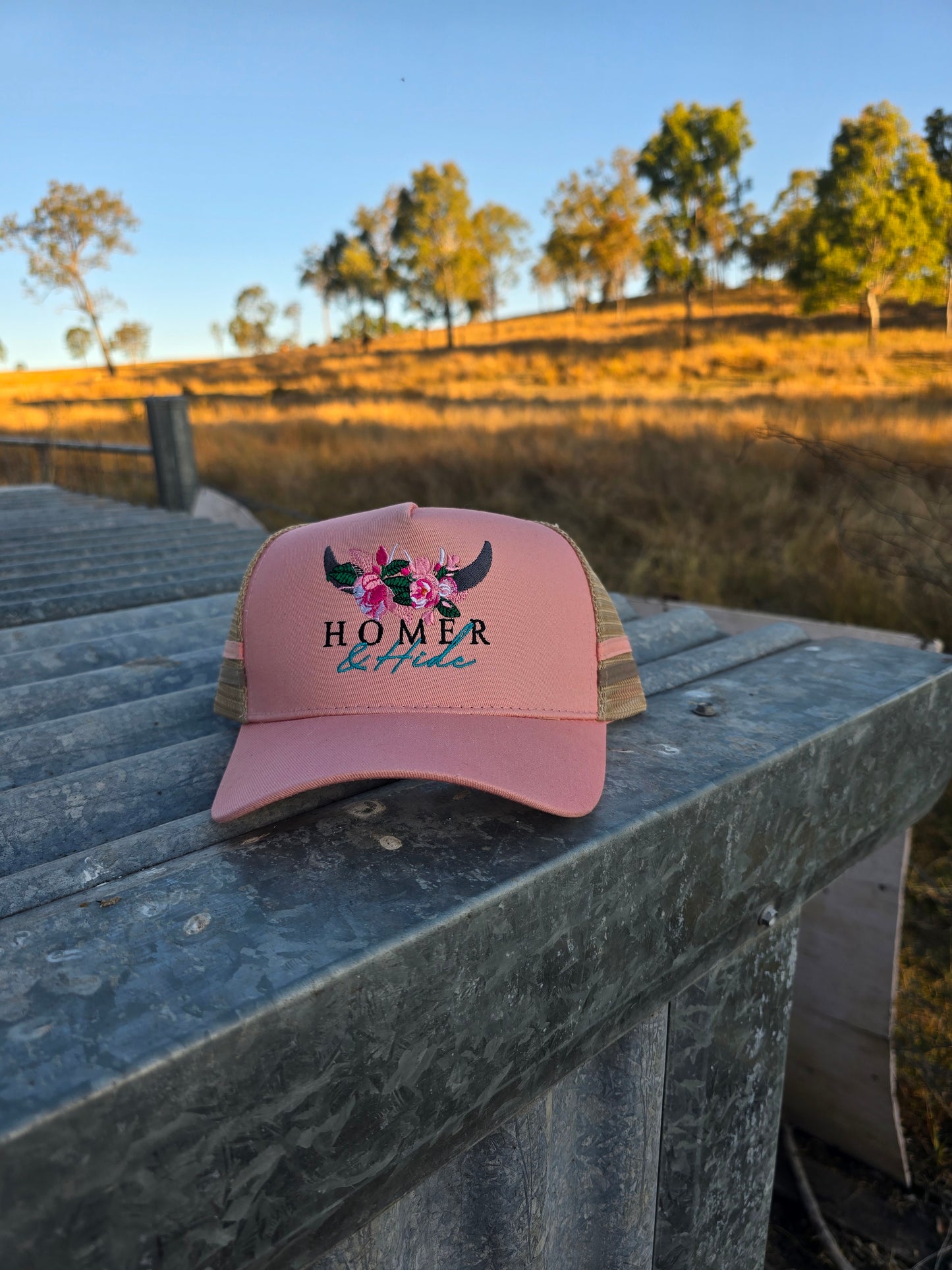 Pink on stone highland cow under brim pony cap (embroiderd)